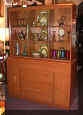 M198 on M593 Credenza with Triple Glass Hutch, 1948-50